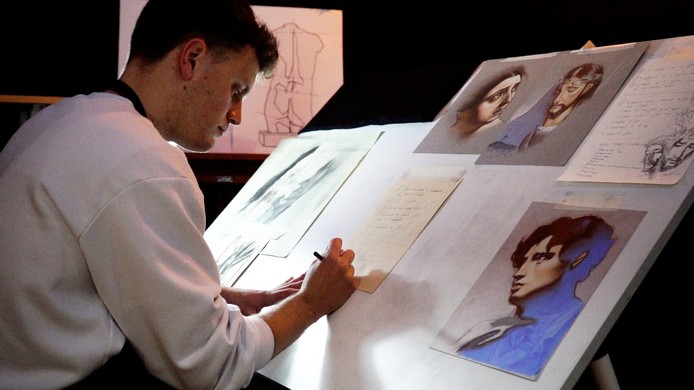 Miguel Carmona pintando Cartel Semana Santa Berja